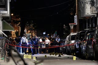Three people have been killed and 10 others were injured after gunmen began firing โrandomlyโ in a South Philadelphia neighborhood, authorities have said