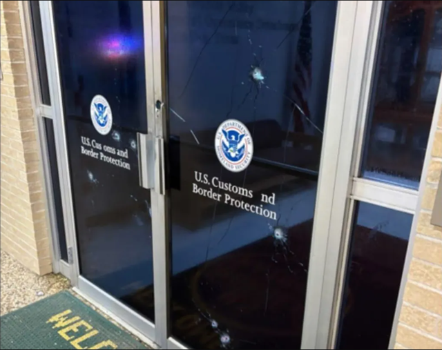 <p>A door at a U.S. Customs and Border Protection office in McAllen, Texas, after it was hit with gunfire on Monday morning.</p>