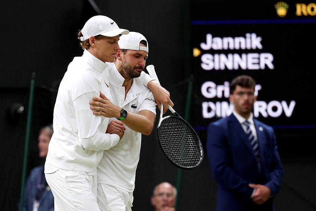Sinner consoling an emotional Dimitrov