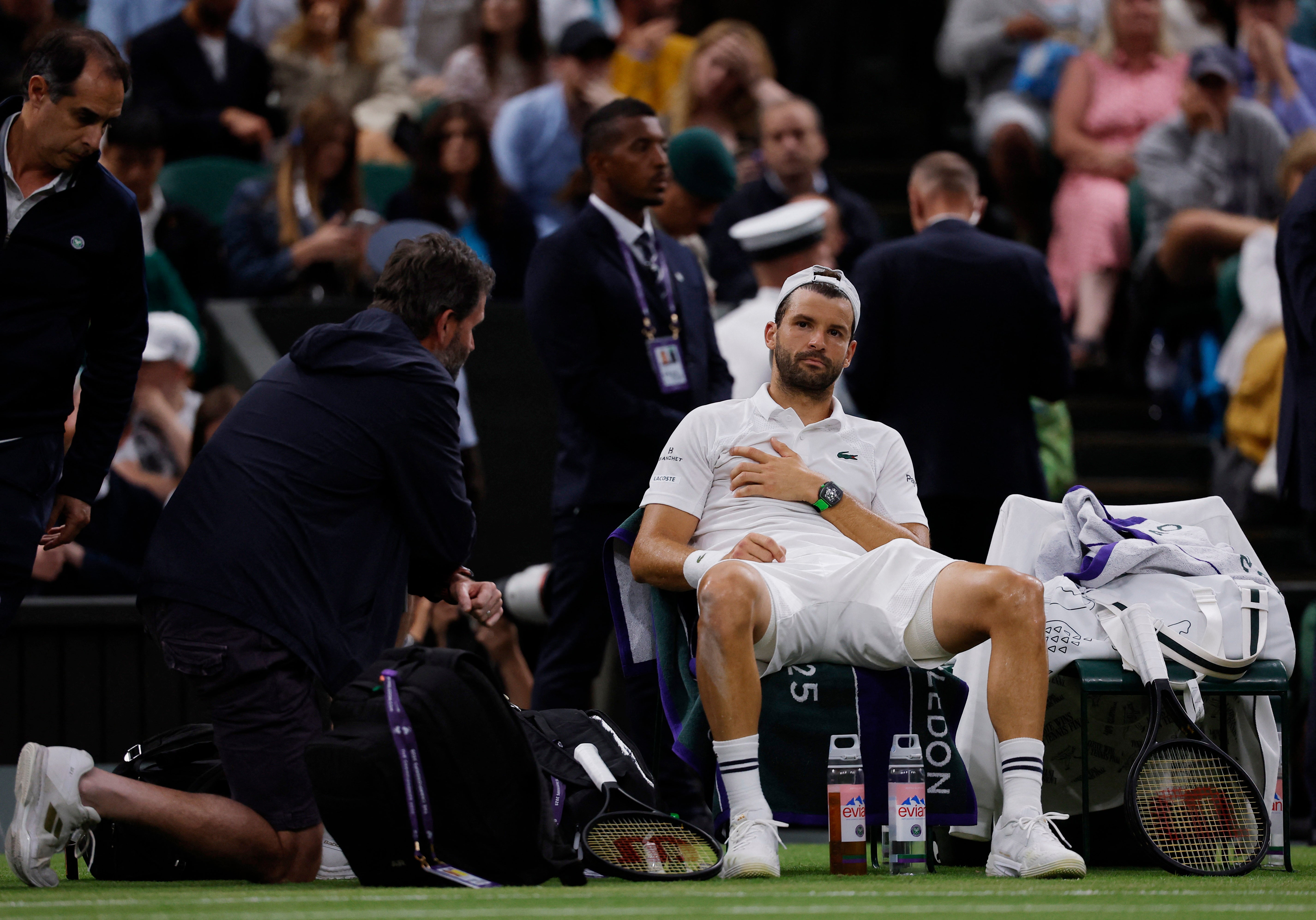 Physios checked on Dimitrov, who broke down in tears