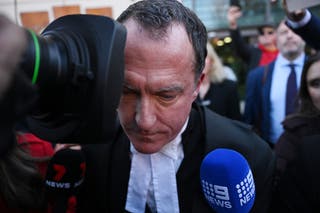 Defence barrister Colin Mandy SC leaves the Latrobe Valley Magistrates Court in Morwell, Victoria