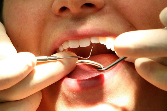 Satisfaction with NHS dentistry has fallen to a record low (Martin Rickett/PA)