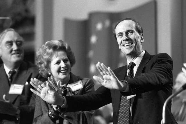 Norman Tebbit accepts the applause after addressing the 1985 Tory conference in Blackpool (PA)