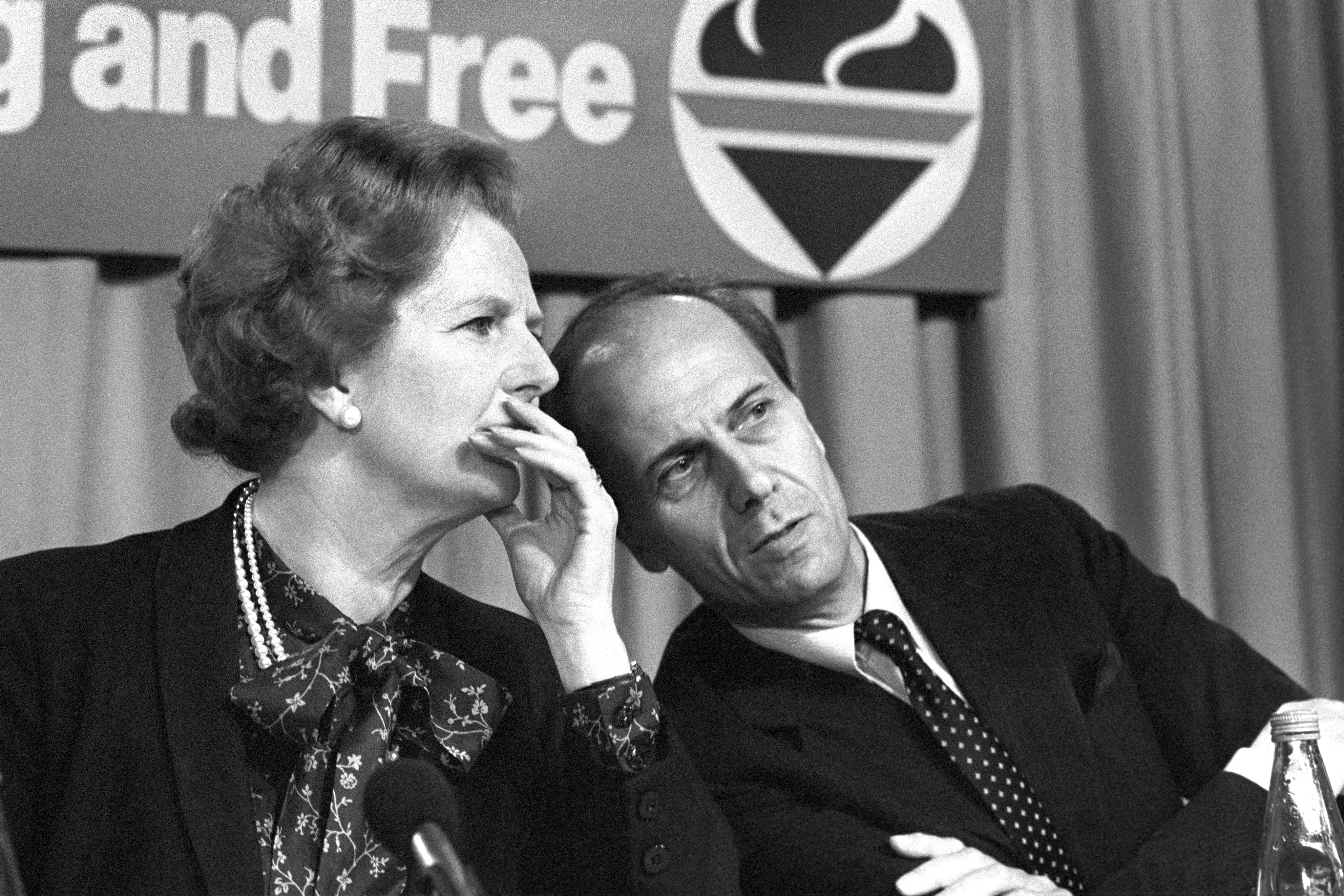 Margaret Thatcher with then employment secretary Norman Tebbit at the Conservative Party press conference in London (PA)