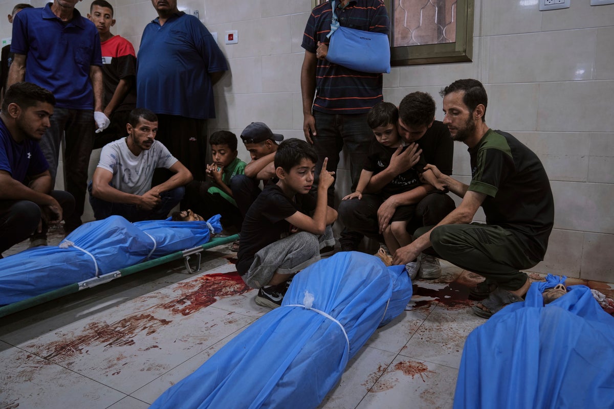 Photos show Palestinians mourning after people were killed in Israeli strikes