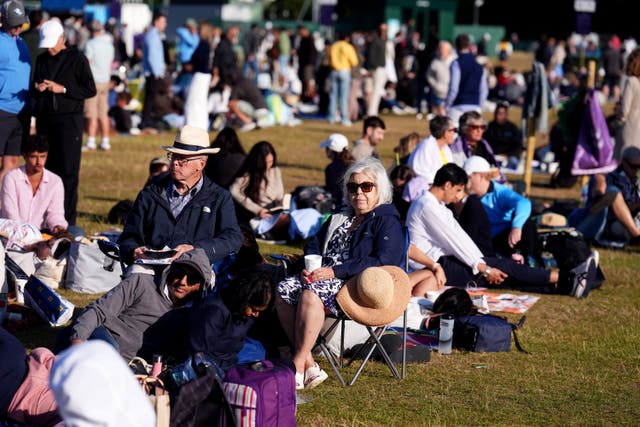 Spectators in the queue on day nine of the 2025 Wimbledon Championships (Mike Egerton/PA)