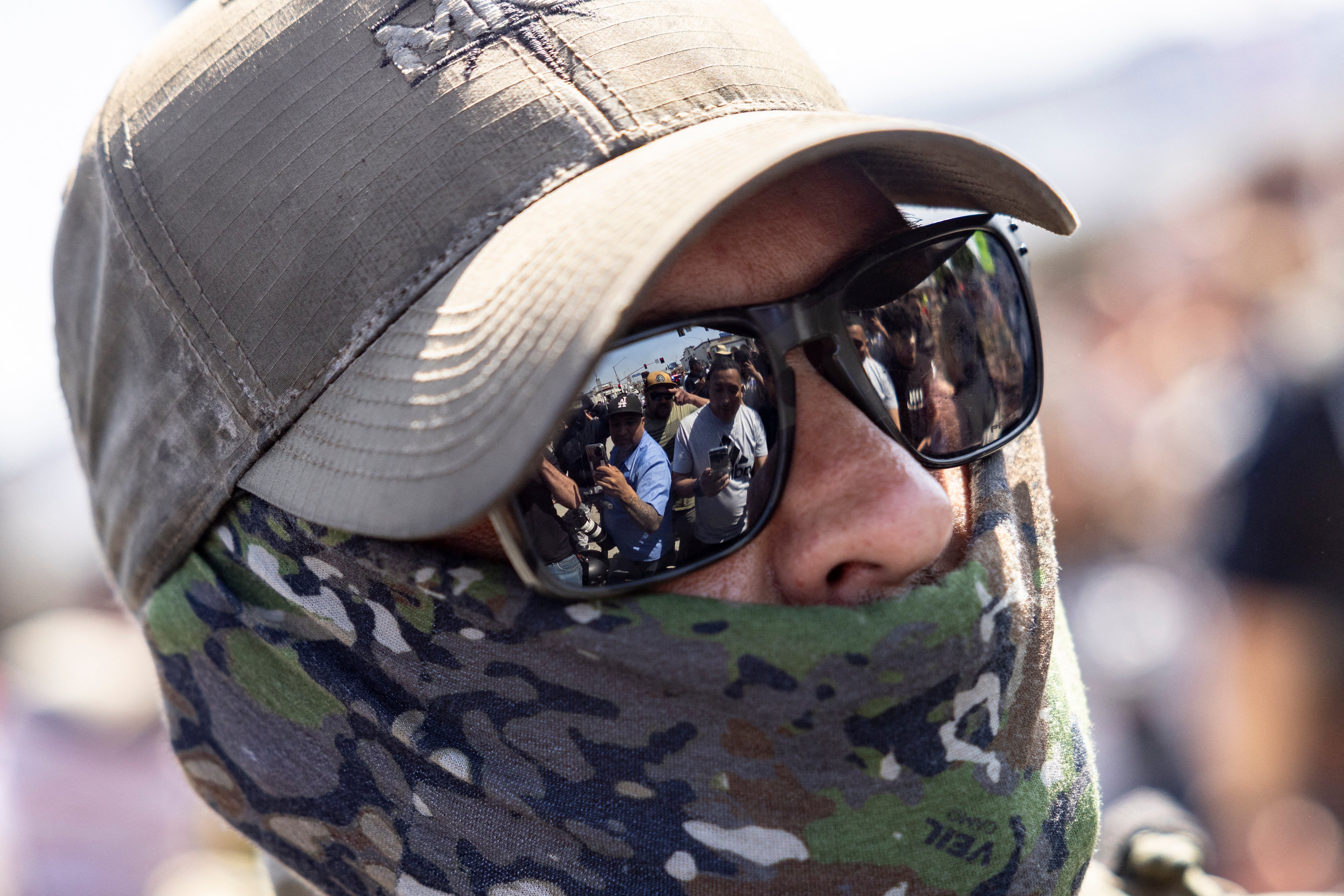 Immigration law enforcement personnel have worn facial coverings that make it difficult to determine their identity, which Democrats say increases fear among civilians