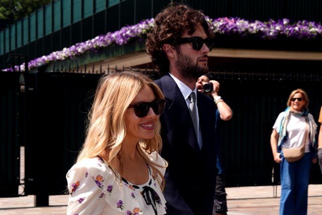 Sienna Miller with Oli Green on day nine of the 2025 Wimbledon Championships at the All England Lawn Tennis and Croquet Club, London (Ben Whitley / PA).