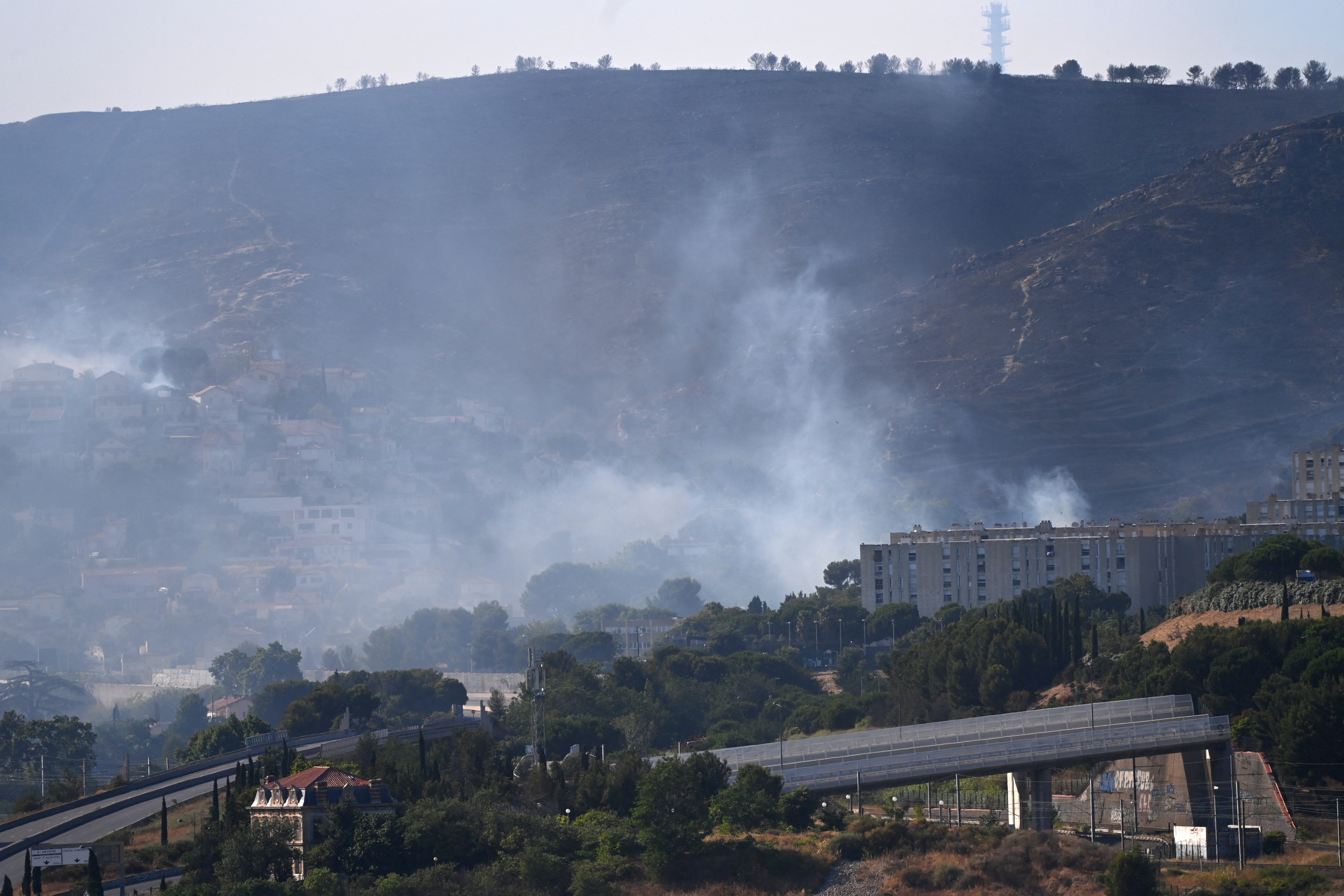 Smoke rises via the French city on Tuesday