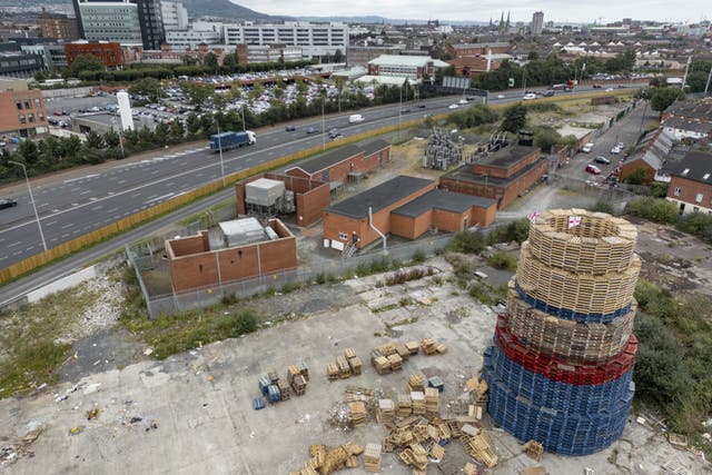 A bonfire on Broadway Industrial Estate off Donegal Road in south Belfast, ahead of events to mark the Twelfth July, that sits yards away from a Northern Ireland Electricity substation and close to two major Belfast hospitals. (Liam McBurney/PA)