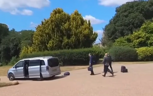 Macron’s car speeds away from Windsor Castle as luggage goes flying