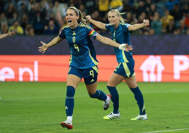 <p>Kosovare Asllani of Sweden celebrates scoring her team's second goal</p>