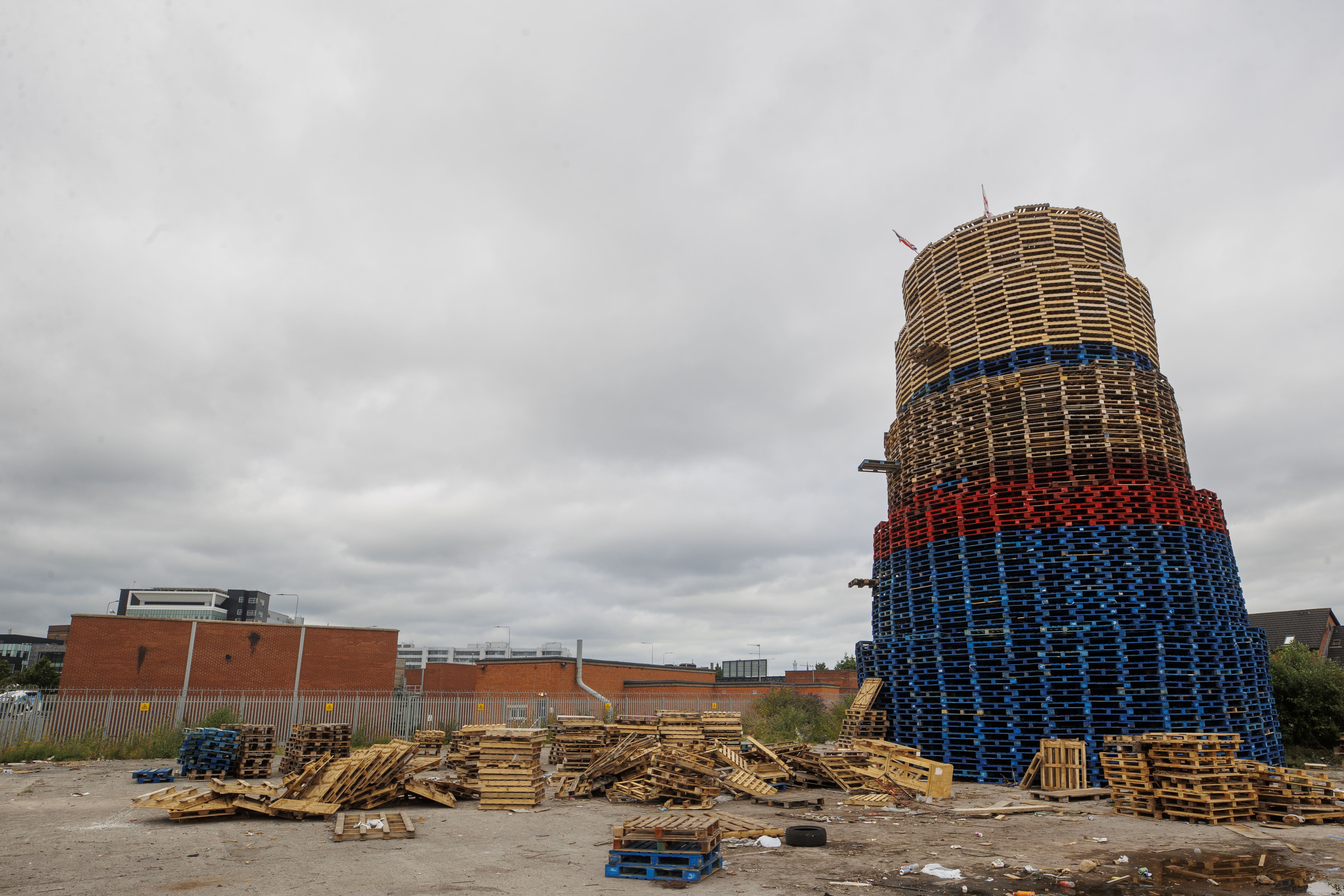 A bonfire on Broadway Industrial Estate off Donegal Road in south Belfast, ahead of events to mark the Twelfth July, that sits yards away from a Northern Ireland Electricity substation and close to Royal Victoria Hospital, Belfast (Liam McBurney/PA)