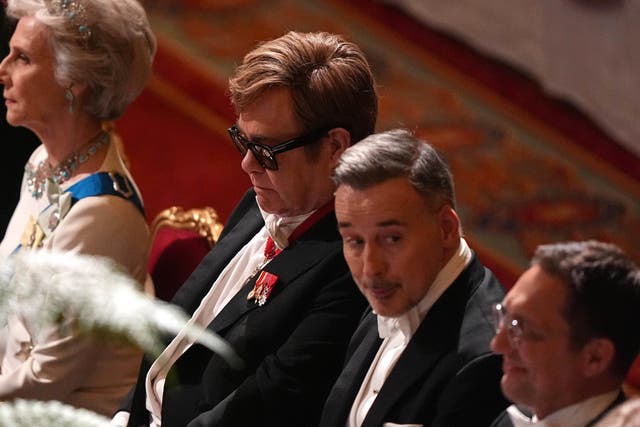 Sir Elton John and David Furnish at the state banquet (Aaron Chown/PA)