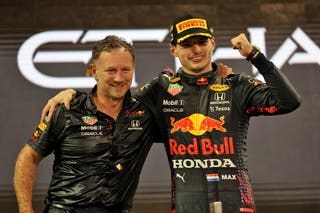 Max Verstappen (right) celebrates alongside Horner after winning his first world title in December 2021 (PA)