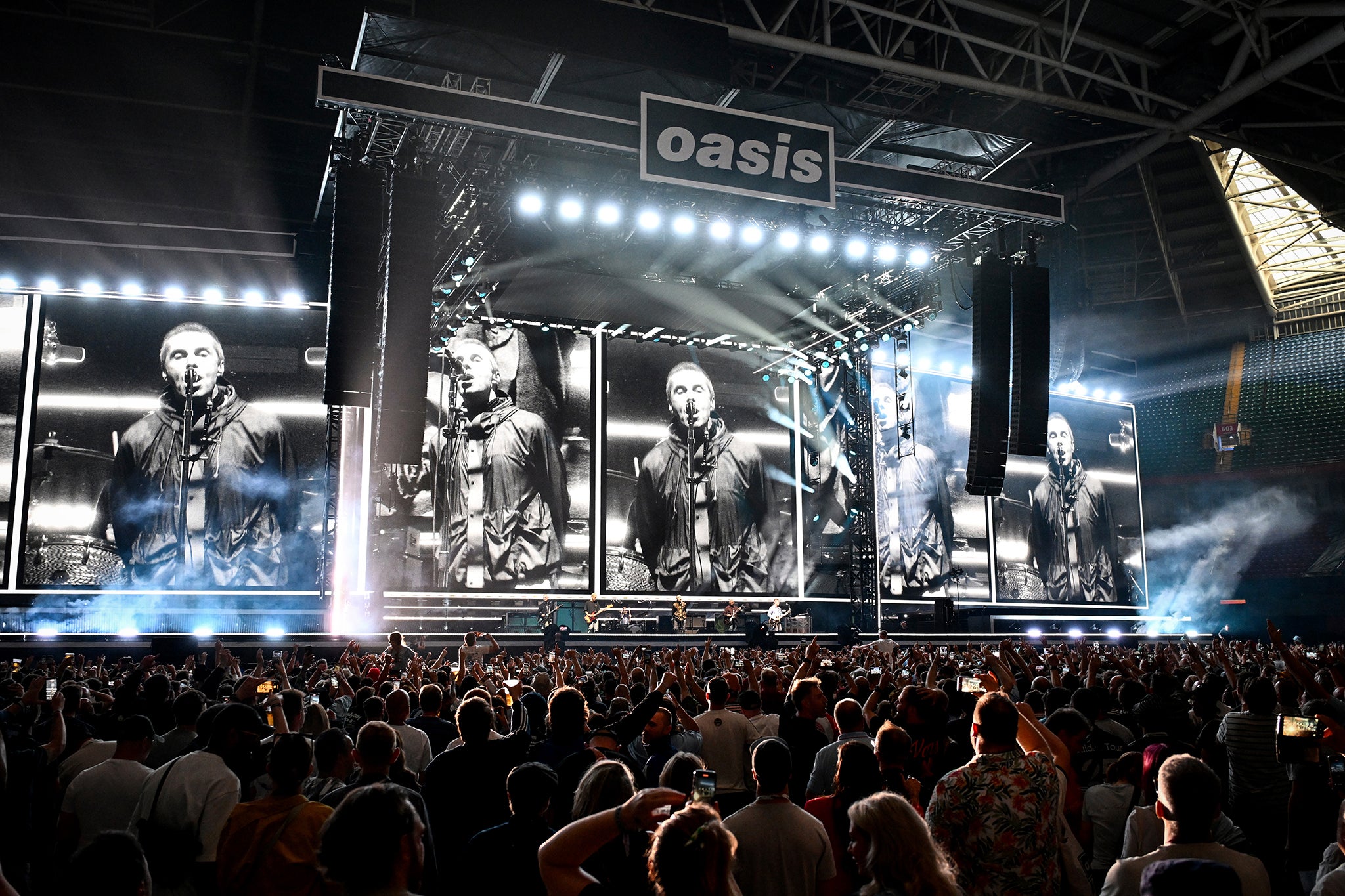Scenes at Oasis’s first reunion show in Cardiff on 4 July