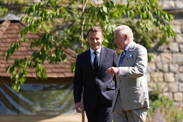 <p>King Charles (right) and the President of France Emmanuel Macron visit the South garden at Windsor Castle (Aaron Chown/PA)</p>