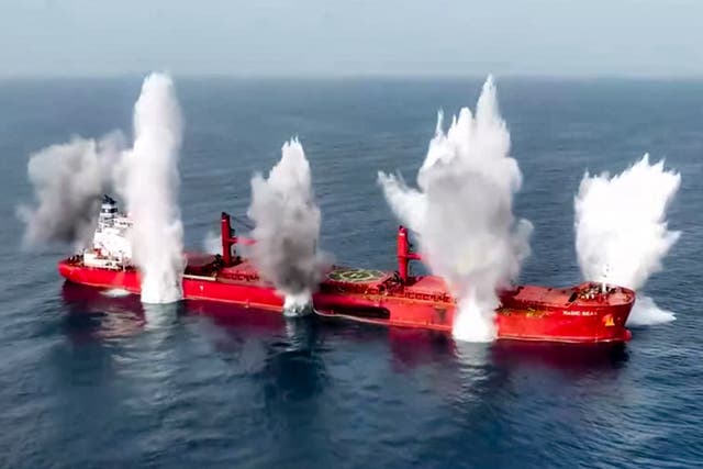 <p>This handout picture released by Yemen's Huthi Ansarullah Media Centre on July 8, 2025 shows a view of explosions on the Liberia-flagged bulk carrier Magic Seas, which was attacked by Huthi-affiliated fighters at sea. Y</p>