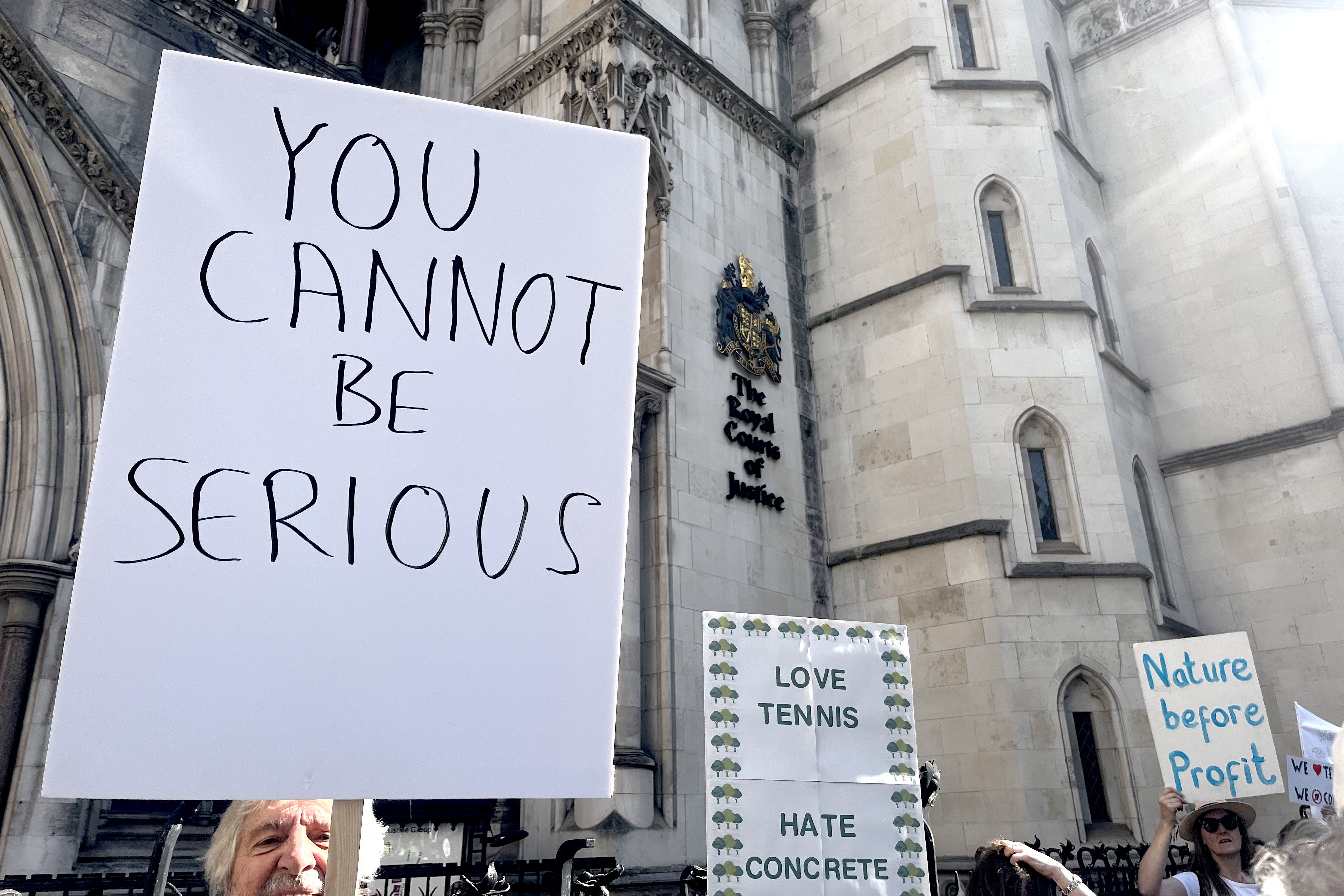 Several campaigners demonstrated outside the Royal Courts of Justice on Tuesday (Callum Parke/PA)
