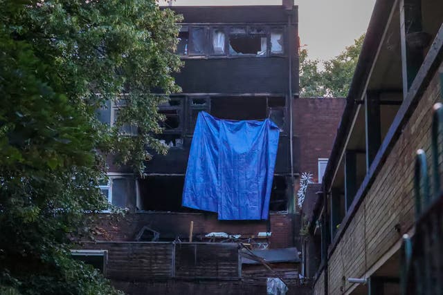<p>Emergency services were called to Lewisham Road in South London on Tuesday night after a report of a fire at a flat</p>