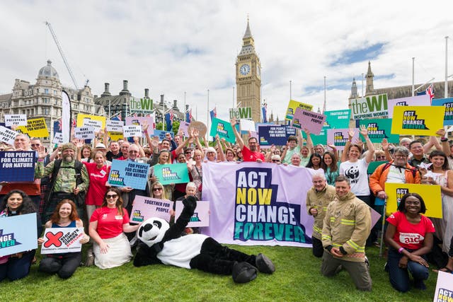 People gather at Parliament Square in London for the Act Now Change Forever Mass Lobby (Richard Dawson/ PA Assignments)