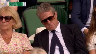 Hugh Grant spotted dozing off in Wimbledon crowd