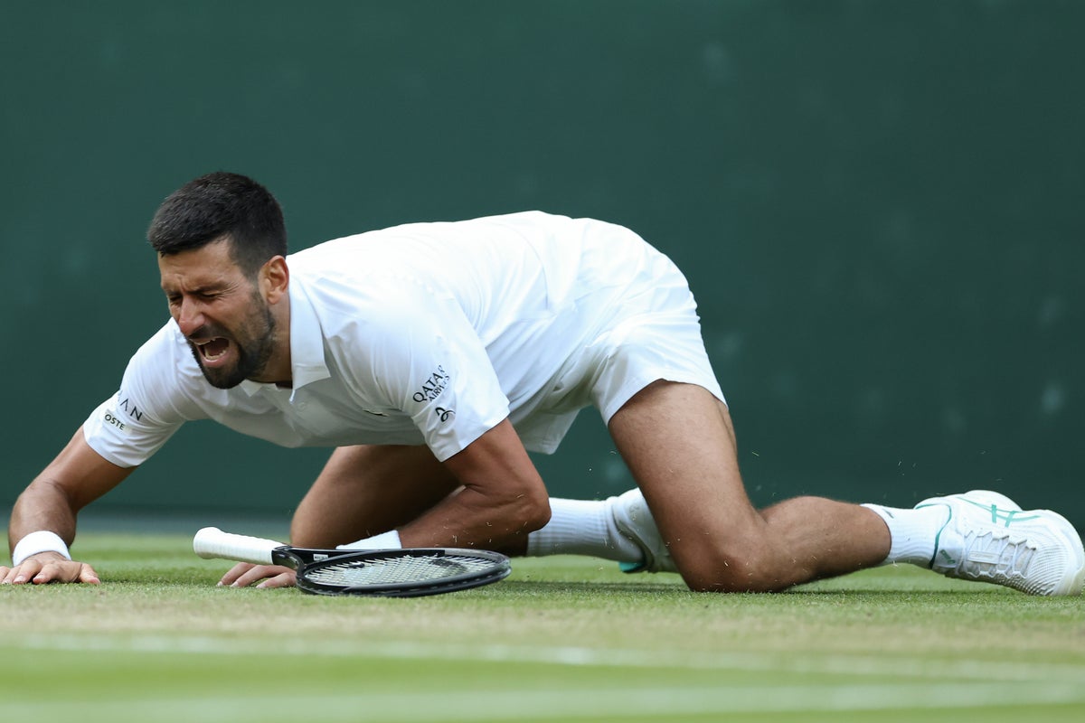 Novak Djokovic survives late fall to seal spot in Wimbledon semi-finals
