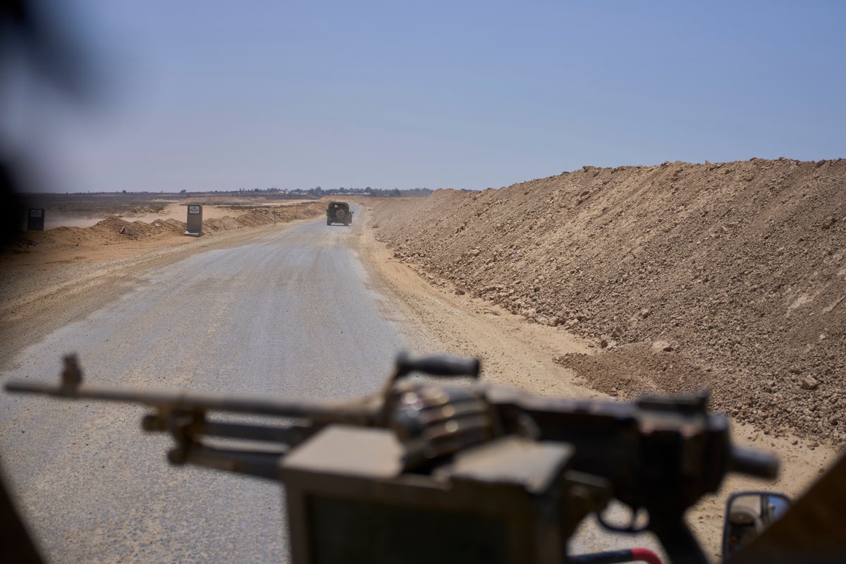 Israel insists on keeping troops in Gaza. That complicates truce talks with Hamas