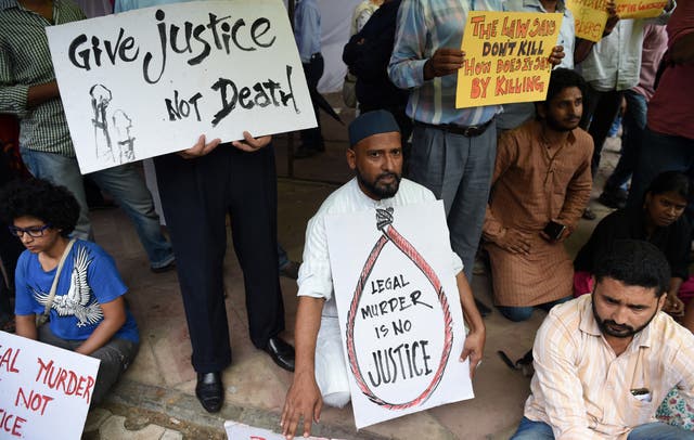 <p>File. Indian activists hold placards during a protest against capital punishment in Delhi on 30 July 2015</p>