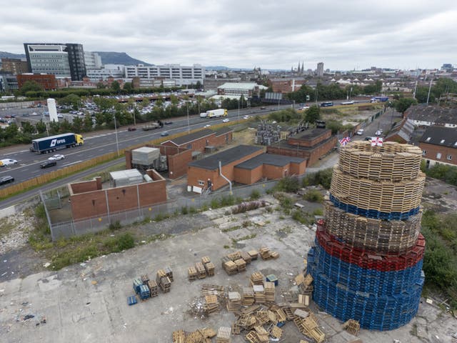 <p>A bonfire on Broadway Industrial Estate off Donegal Road in south Belfast (Liam McBurney/PA)</p>