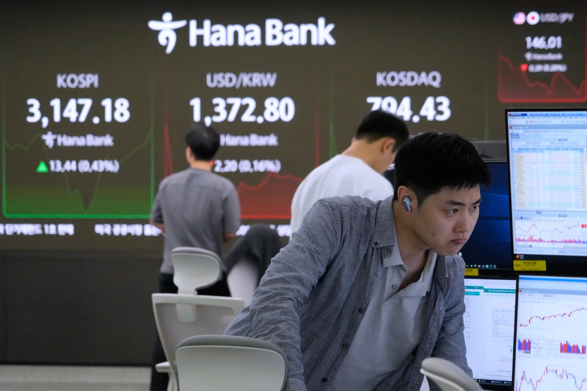 Asian shares mostly gain after big tech rally on Wall Street