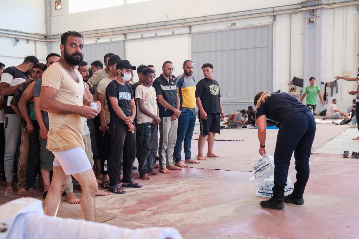 Hundreds of migrants moved from Crete to Greek mainland as island struggles with Libya arrivals