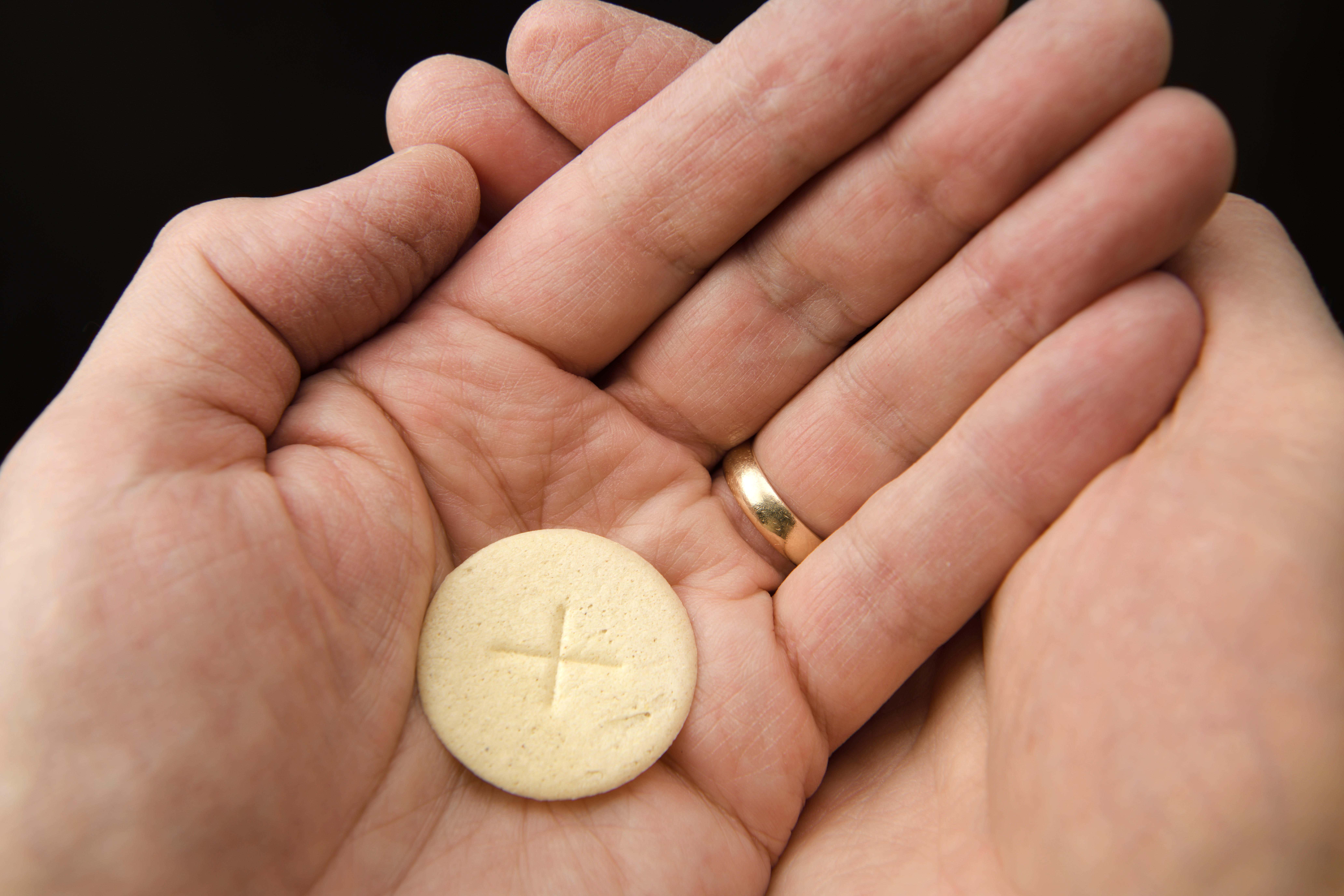 The Church of England said it is considering the case of people who cannot have gluten or alcohol and their participation in holy communion (Alamy/PA)