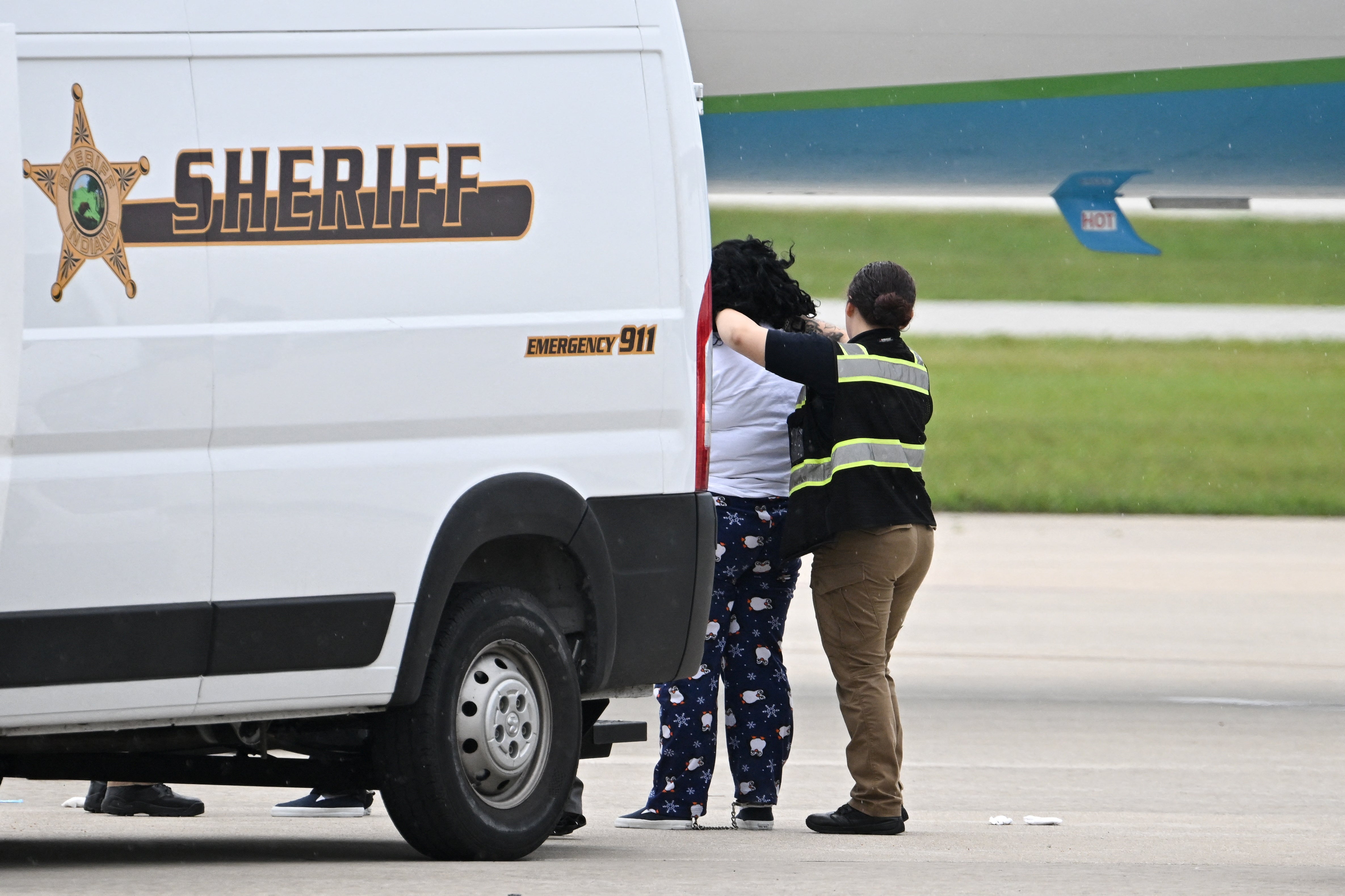 A migrant detained by ICE at Gary/Chicago International Airport in June