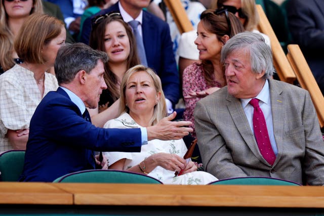 Sir Stephen Fry speaking with Rob Brydon, left, in the Royal Box (Mike Egerton/PA)