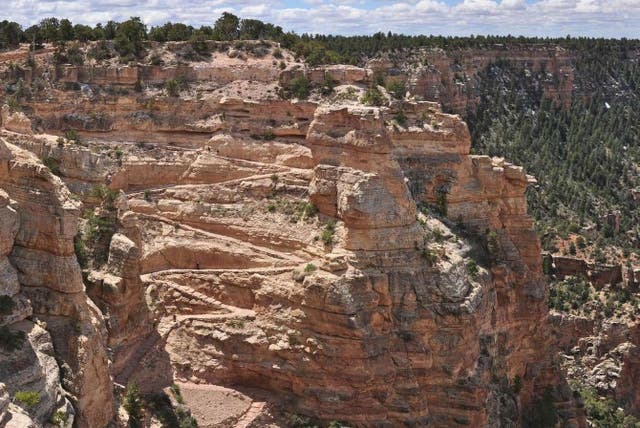 <p>A view of the South Kaibab Trail at the Grand Canyon in Arizona, where a 67-year-old hiker died on Tuesday</p>