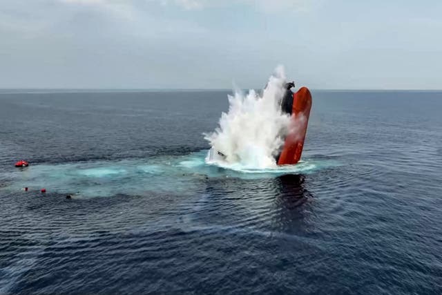 <p>This handout picture released by Yemen’s Houthi group reportedly shows the Liberia-flagged bulk carrier Eternity C sinking after it was attacked</p>