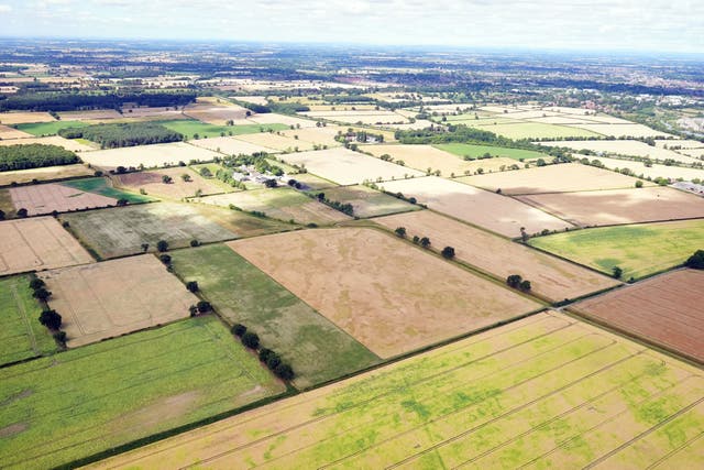 An aerial view of dry fields in York (Owen Humphreys/PA)