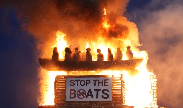 <p>The bonfire in Co Tyrone has been widely criticised (Niall Carson/PA)</p>