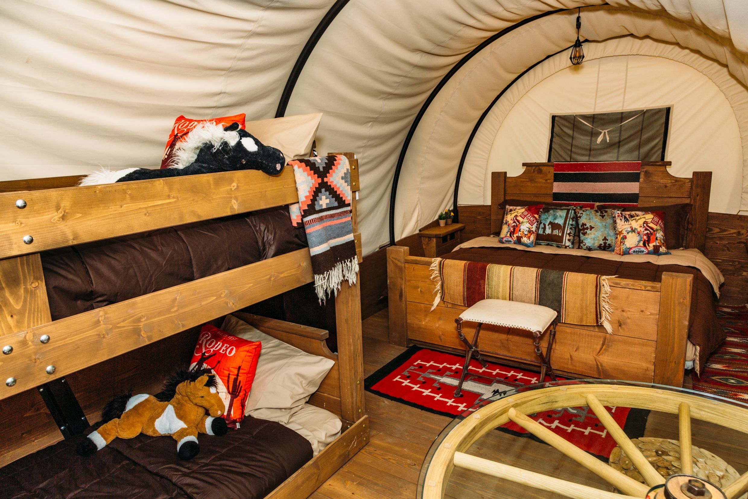 Inside the wagon is a king and bunk bed