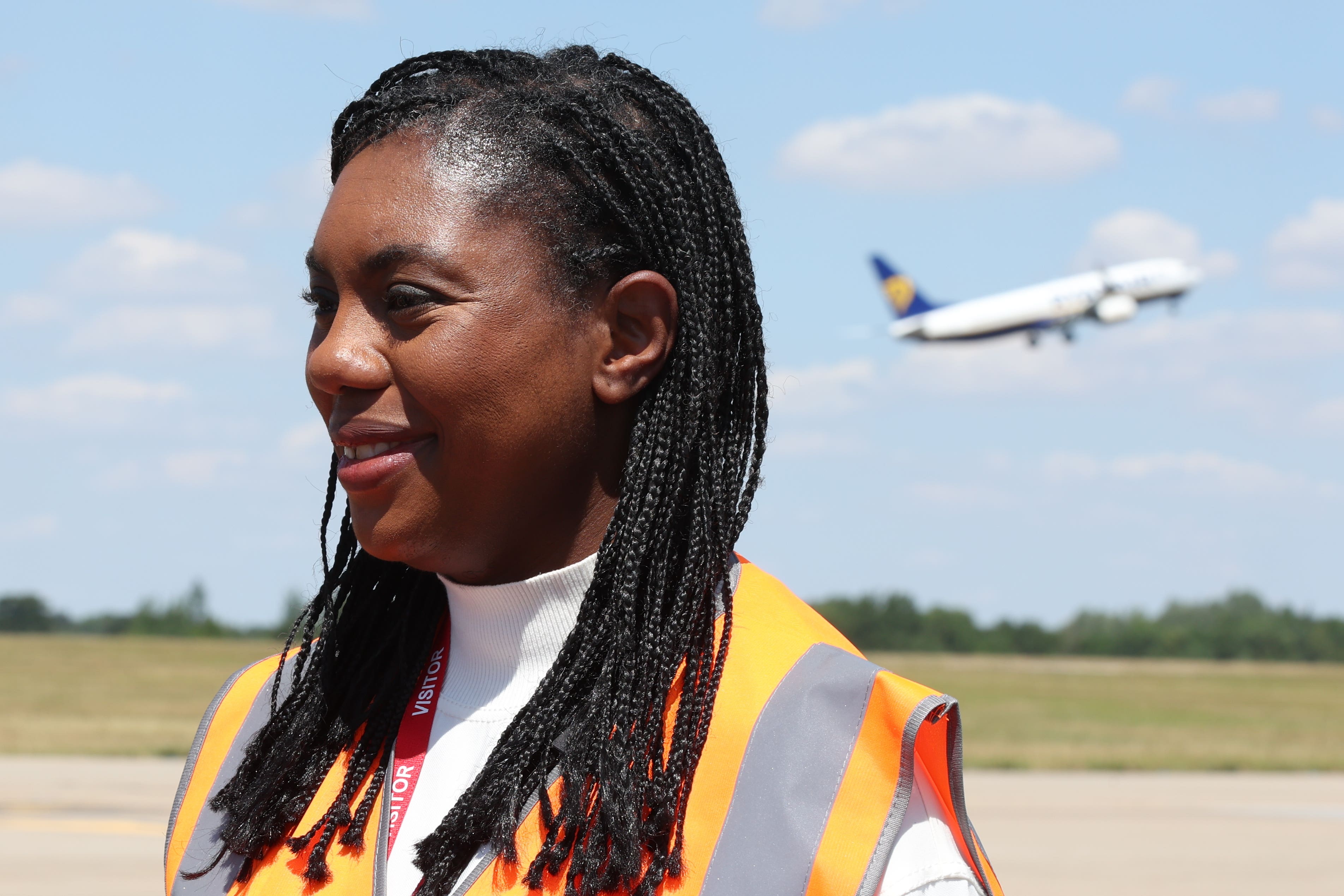 Conservative Party leader Kemi Badenoch met staff during a visit to Stansted Airport in Essex (Chris Radburn/PA)