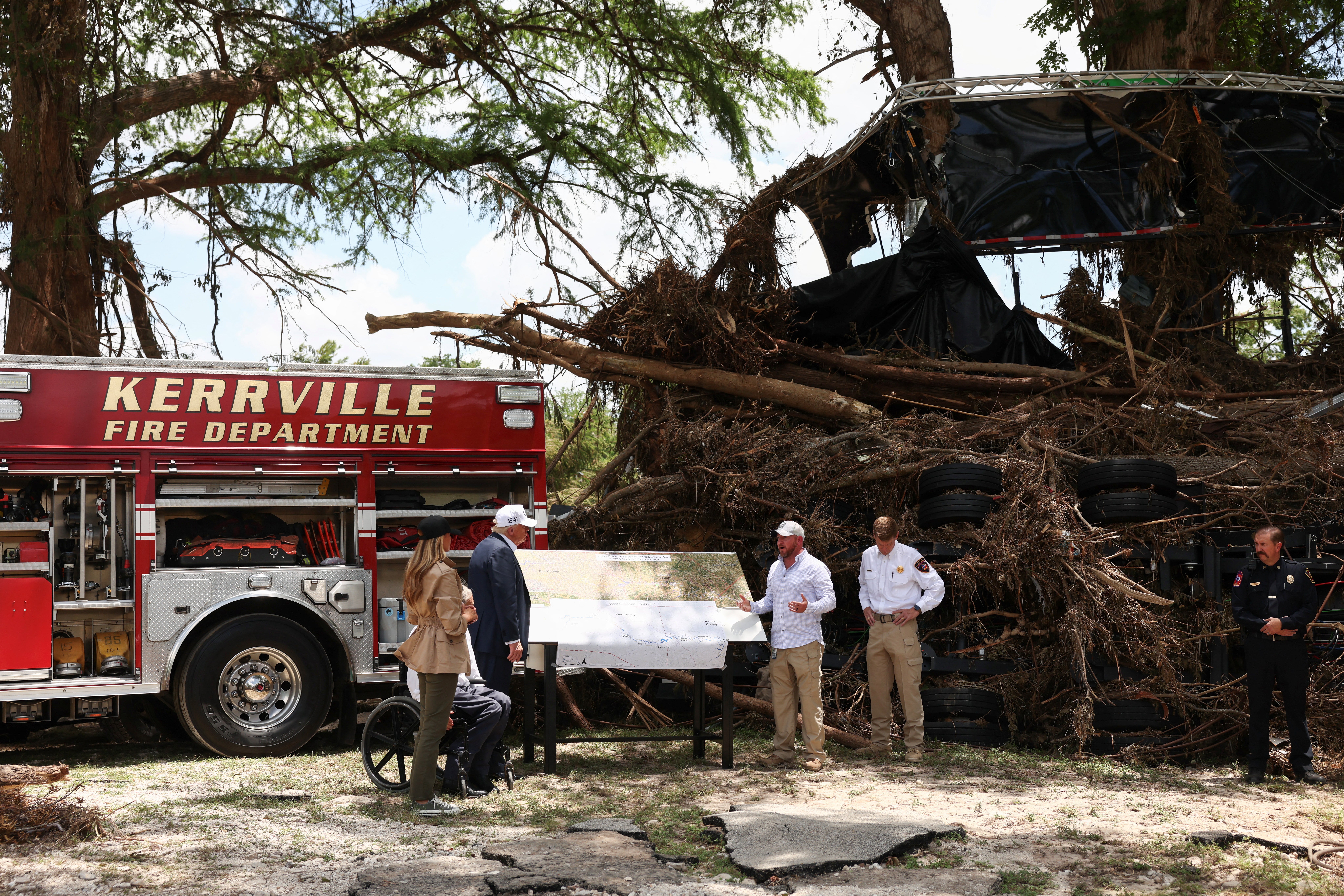 President Donald Trump and first lady Melania Trump visit a scene of devastation along the banks of the Guadalupe River, after catastrophic floods, Kerr County, Texas