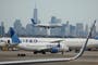 United Airlines worker sues after being forced to remove 300-lb corpse