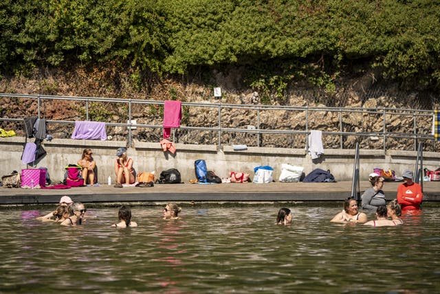 <p>Temperatures could reach 28C or 29C on Thursday and Friday (Ben Birchall/PA)</p>