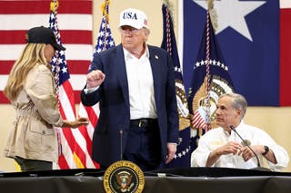 President Donald Trump, first lady Melania Trump and Texas Governor Greg Abbott participate in a roundtable with first responders and local officials after catastrophic floods, at Hill Country Youth Center, in Kerrville, Texas