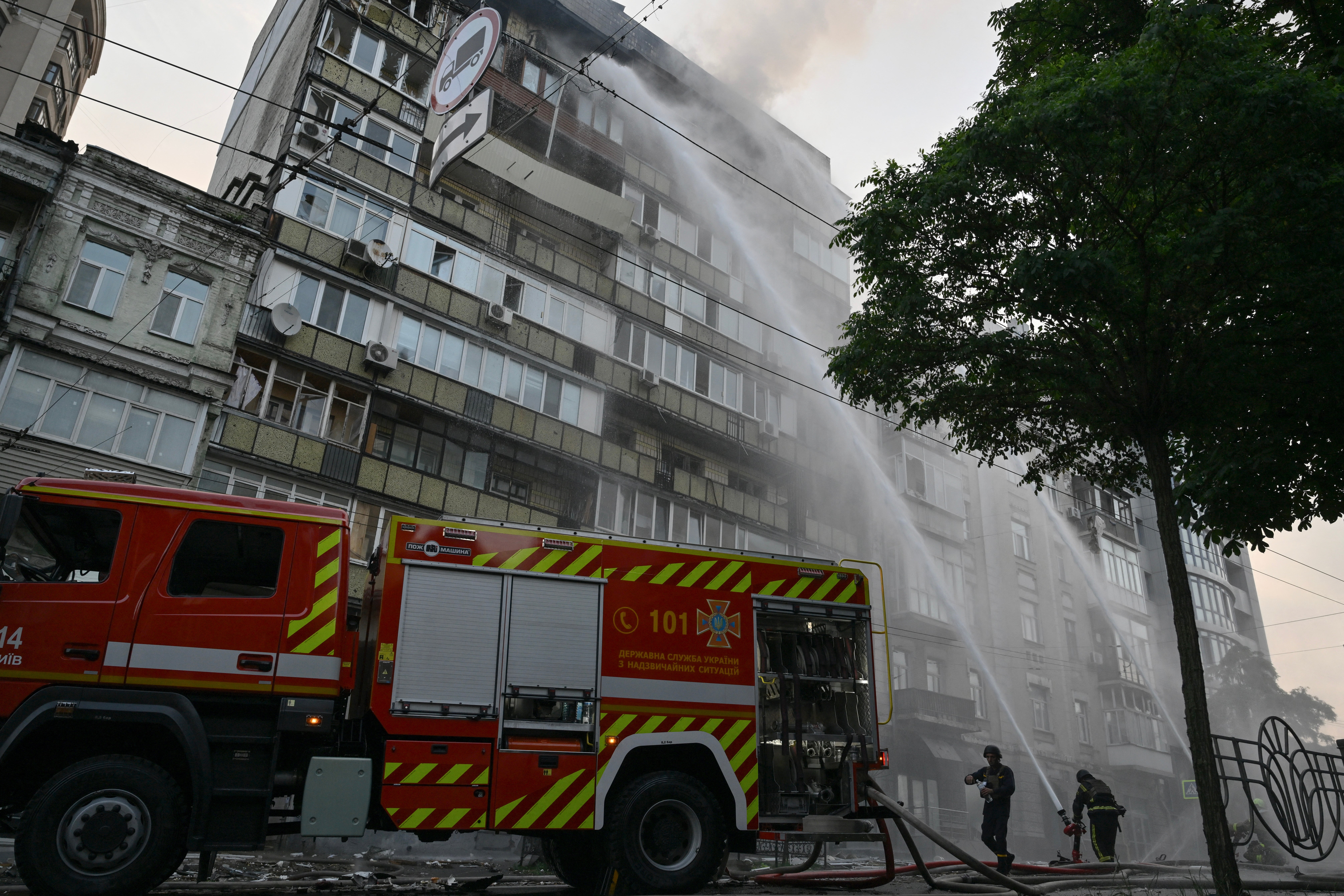 Ukrainian Firefighters Fire Fire in a residential building after Russian rocket and drone attacks in Kiev 10. July 2025. Years