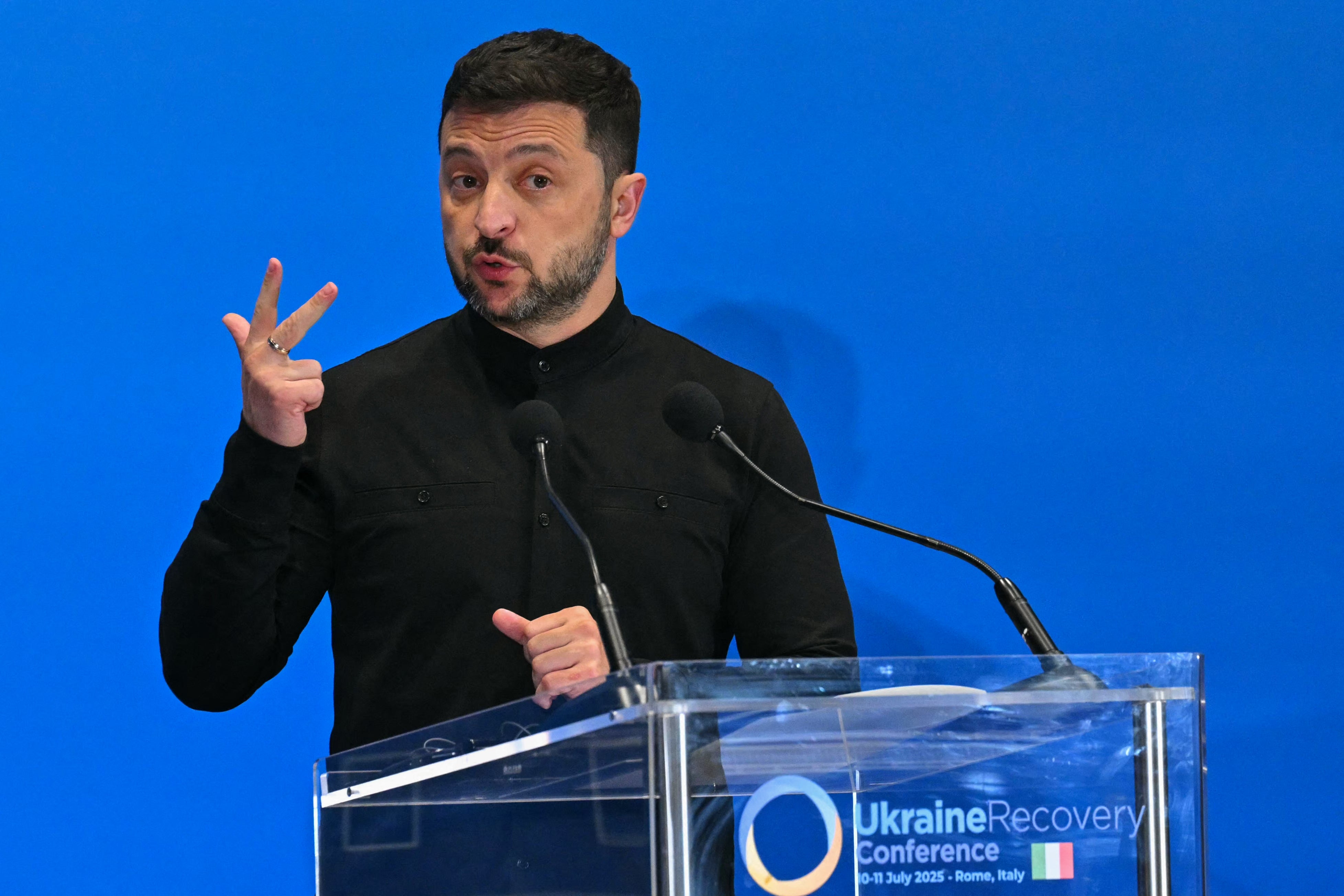 Ukrainian President Volodymyr Zelensky deals with conference for journalists during the conference on recovery in Ukraine 2025