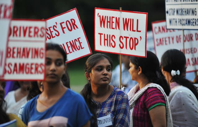 <p>File: Indian activists holds placards as they protest against violence and crimes against women</p>