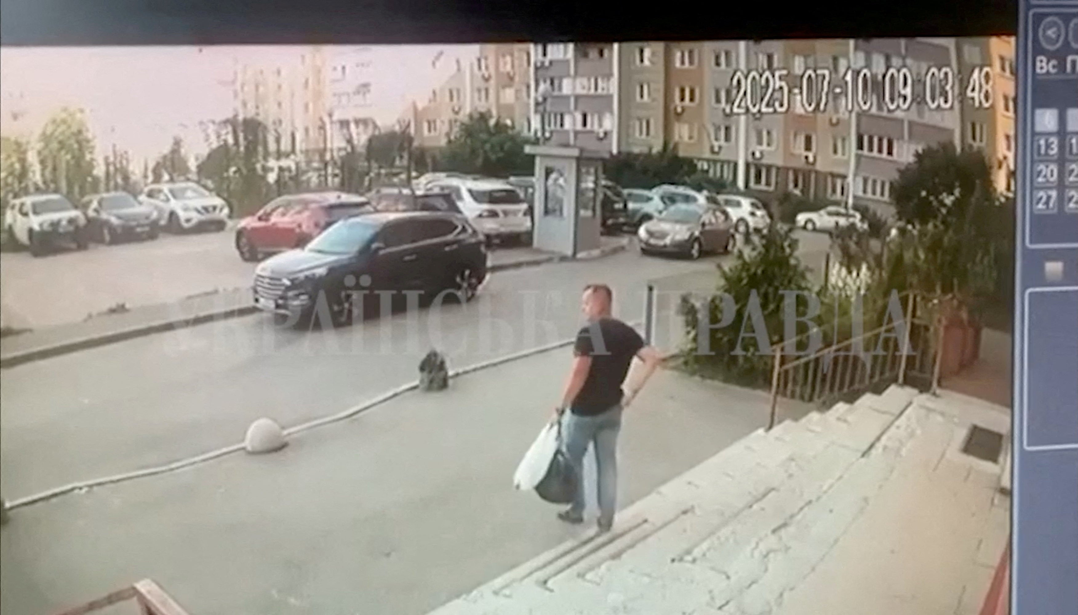 CCTV footage shows a Security Service of Ukraine officer walking down the stairs moments before he was shot in Kyiv on Thursday. He has since been identified as Colonel Ivan Voronych