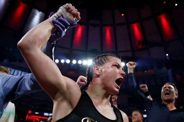 <p>Katie Taylor celebrates after defeating Amanda Serrano by a majority decision</p>
